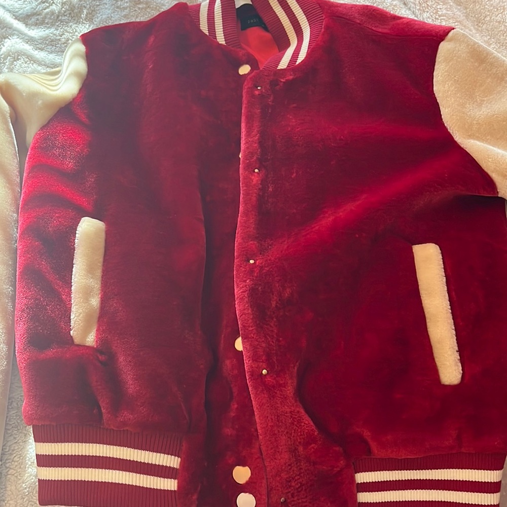Cute varsity jacket never worn